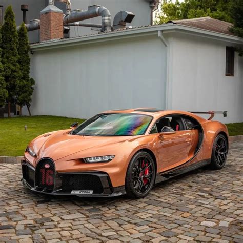 Andrew tate bugatti wallpaper - Andrew Tate Bugatti Stats. Price: $5.2 Million Dollars With All Features, Custom Paint Job Color: Reddish-Bronze Color With Custom Finish Model: Bugatti Chiron Pur Sport (Extremely Rare) Engine: 8.0 L Quad-Turbocharge W16 Engine Speed: Top Speed 305 MPH, 0-60 MPH In 2.4 Seconds Interior: Black With Red And Copper …